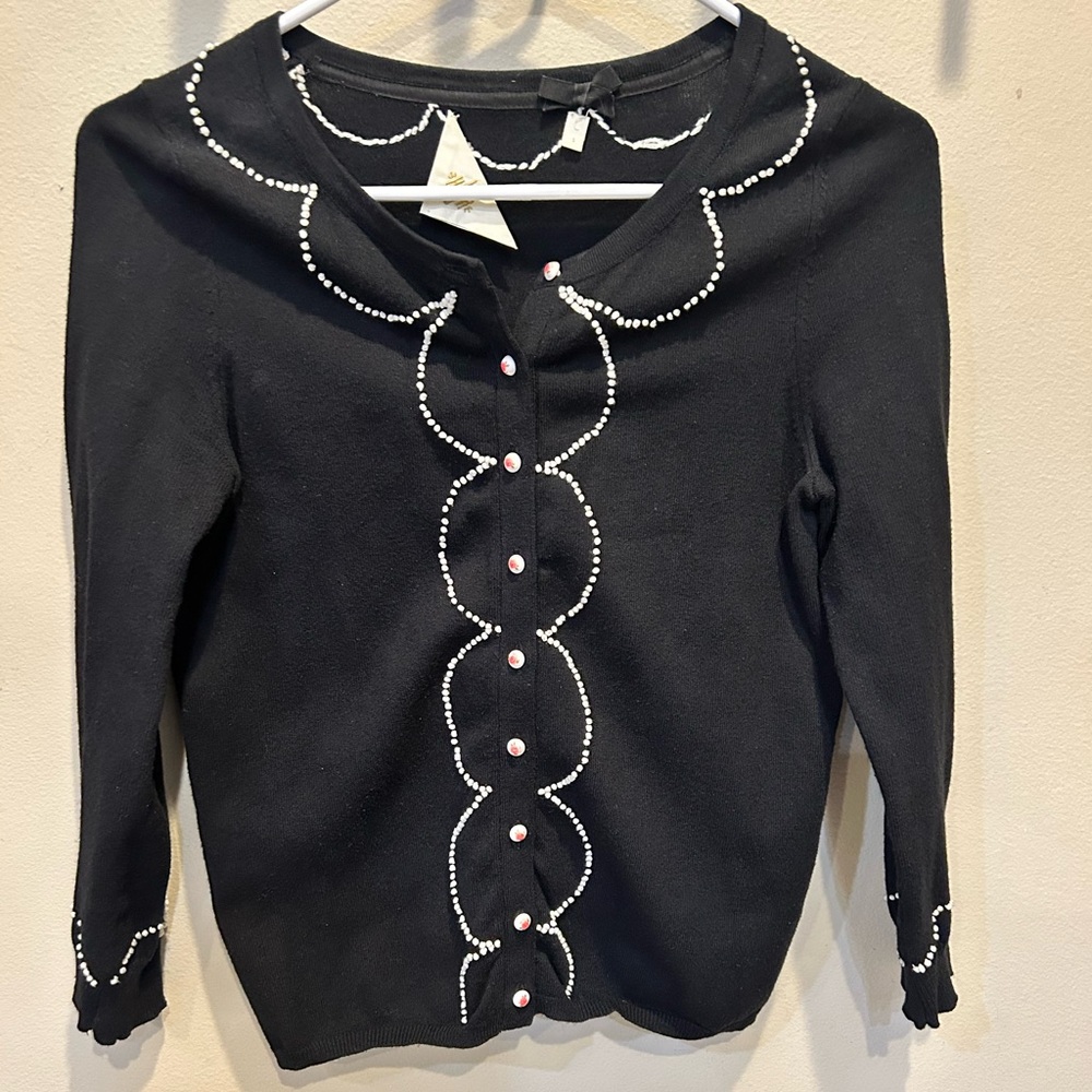Anthropologie embroidered sweater.